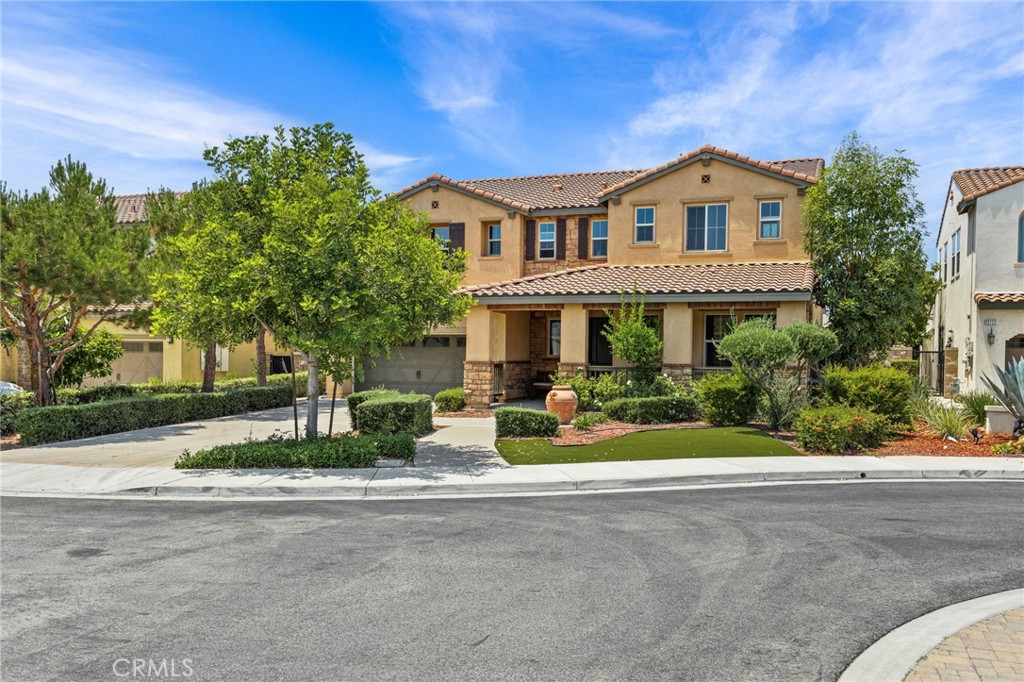 Welcome to the stunning former model home nestled in a prestigious gated community in Chino. Built in 2015, this exquisitely upgraded residence boasts 5 bedrooms and 5 bathrooms across an expansive 3,534 square feet of living space, situated on a generous 6,994 square foot lot.
Honored as the Mayor’s Home of Chino, this property showcases premium finishes and thoughtful design throughout. The fully upgraded interior features new flooring upstairs and in all bedrooms, a spacious second-floor loft, and a dedicated home office with custom built-in bookcases.
The heart of the home is the gourmet kitchen, highlighted by a massive granite island, stainless steel appliances, and an additional high-heat wok kitchen, ideal for stir-fry and serious cooking. Downstairs also includes a private bedroom suite, perfect for guests or multi-generational living.
Step outside to your entertainer’s dream backyard—complete with a huge California room, an outdoor fireplace, and ample space to relax or host gatherings. Upstairs, the primary suite features a luxurious en-suite bath and a private, oversized balcony, perfect for unwinding.
With every detail thoughtfully curated and located in a secure gated community, this rare gem offers the perfect blend of luxury, comfort, and prestige. Don’t miss this one-of-a-kind opportunity!