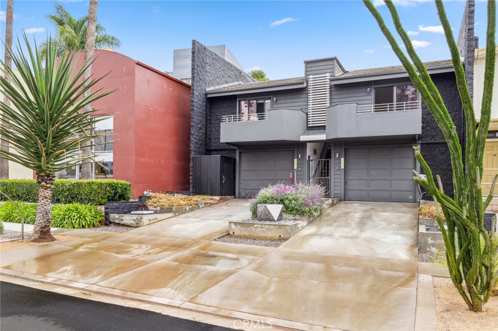 Rarely available, this exceptional coastal live/work property in Capistrano Beach embodies the essence of true urban living and working. Offering a unique blend of commercial and residential space, this versatile property provides an expansive and accommodating environment for a variety of uses. The upper level, spanning approximately 1140 sqft, presents spacious living arrangements with two generously proportioned rooms suitable for use as offices or bedrooms. Ample natural light illuminates the space, complemented by high ceilings, expansive windows, and glass skylights. The open-concept living area encompasses a spacious kitchen and abundant room for a family area and dining space. The primary bedroom features an ensuite bathroom and a walk-in closet, seamlessly connecting to a private backyard with secure gated access. Positioned at the front of the property, the secondary bedroom enjoys ample sunlight with vaulted ceilings and access to a sunny deck. The lower level, also spanning approximately 1140 sqft, comprises a deep expanse that lends itself perfectly to a showroom, offices, or light industrial use. The pristine white backdrop offers a blank canvas for your creative vision. Industrial-style garage rollup doors at the entrance enhance the urban aesthetic. Nestled within the serene Capistrano Beach neighborhood, this prime coastal location provides convenient access to beaches, the Dana Point Lantern District and harbor, San Clemente, San Juan Capistrano, and the I-5 freeway. This extraordinary opportunity to reside and operate in a beachside setting is a rare find that will not be available for long.