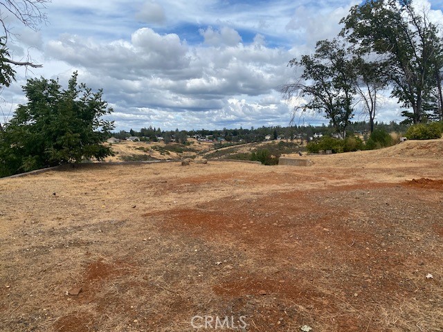 Build your dream home on the edge of Paradise. This 1.86 acre lot has spectacular, serene sunsets and a stunning 180 degree view of Butte Creek Canyon. The property is conveniently located in lower Paradise with a quick commute to Chico or a short drive to the middle of town. Drive by the property, view the lot and imagine the possibilities.