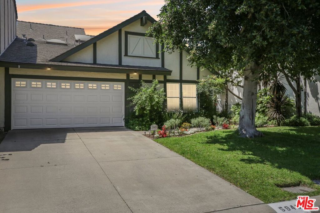 Nestled on a private street in Anaheim's desirable Windsor Hills community, this beautifully updated two-story home offers a bright, open layout filled with charm, comfort, and exceptional upgrades throughout. Step inside to soaring cathedral ceilings, abundant natural light, and expansive interiors designed for everyday living and effortless entertaining. The spacious living room features an inviting gas fireplace and French doors opening to a private backyard, leading to a lush cottage-style garden that wraps to the front, creating a serene, storybook setting. The main-level primary suite is a peaceful retreat with dual closets, a spa-like bath with a sunken tub, and a sliding glass door to the backyard garden oasis, perfect for morning coffee or winding down. The kitchen offers granite countertops, a peninsula with bar seating, a breakfast area, and updated stainless steel appliances including a double oven and refrigerator. The open dining area with a built-in wet bar provides an ideal space for entertaining. Upstairs are additional bedrooms and a bright layout enhanced by a skylight above the staircase. New flooring runs throughout the main floor and most of the second level, adding warmth and style. A dedicated laundry area is conveniently located off the kitchen next to the garage. Windsor Hills features amenities including a large pool, spa, and tennis court. Enjoy being minutes from parks, schools, shopping, dining, and entertainment, all within vibrant Anaheim. Experience the comfort, privacy, and charm of Windsor Hills in a home that truly has it all!