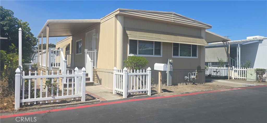 Garden Grove Mobile home for sale. Family park. Move in Conditions. Beautiful kitchen, spacious bedrooms. 1 masters. Large family room and living room. Must see. No carpets in home. 3 cars space parking. Large front porch. Clean and beautiful. ready to move in.