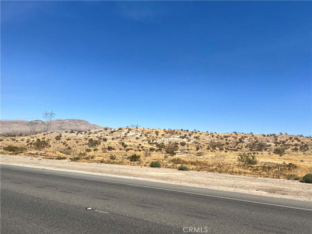±14 acres of unimproved apartment land for sale at the intersection of Apple Valley Rd and Tuscola at the border of Victorville and Apple Valley; APNs: 0473-141-32. Zoned Multifamily (R-M) this site will permit for the development of up to 20 dwelling units per acre. Water, sewer, and power are all available at site. The property is located in Apple Valley’s prestigious Desert Knolls area, home of St. Mary’s Medical Center, which is only ±0.5 miles away. This site is immediately adjacent to Highway 18 and only 2 miles from Interstate 15 for quick access to all major routes of transportation in the High Desert. Nearby amenities for future residents include Costco, Target, Walmart, Sav-on Pharmacy, CVS Pharmacy, UPS Store, Old Navy, Ross Dress for Less, Los Domingos Mexican Restaurant, Ninja Sushi, Jack in the Box, El Pollo Loco, Carl’s Junior, Starbucks, Del Taco, Jersey Mike’s and more. This site is also Apple Valley is home to Brightline West’s High-speed rail station, an under-construction project connecting Las Vegas to Rancho Cucamonga at speeds greater than 200 miles per hour, set to be in operation by the end of 2028. An abutting ±12 acres of additional land also. Buyer to verify all information contained herein. Agent and their representatives are not responsible for the accuracy of these claims. Listing agent has an ownership interest in the property.