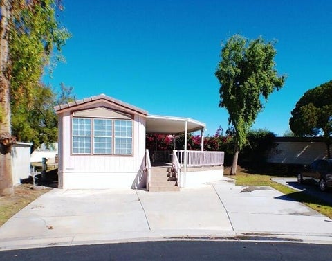 Photo of 84136 Avenue 44, 61 #61, Indio, CA 92203 (MLS # 219154737DA)