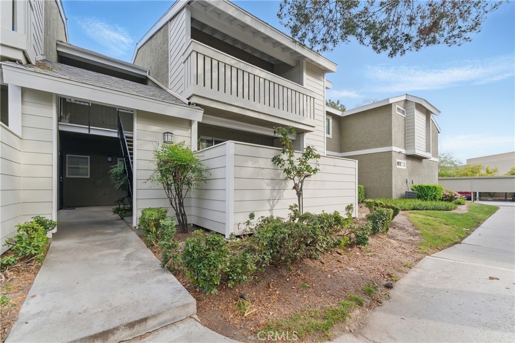FHA & VA approved. Move-in ready 2-bedroom, 1-bath lower-level condo in a quiet location. Recent upgrades include a remodeled bathroom with custom tile and rain shower, smart thermostat, LED lighting, and in-unit laundry with washer and dryer included. Private enclosed patio with storage. Two assigned carport spaces. Pool, spa, and landscaped grounds. Close to schools, shopping, dining, and parks. Low HOA dues and no Mello Roos.