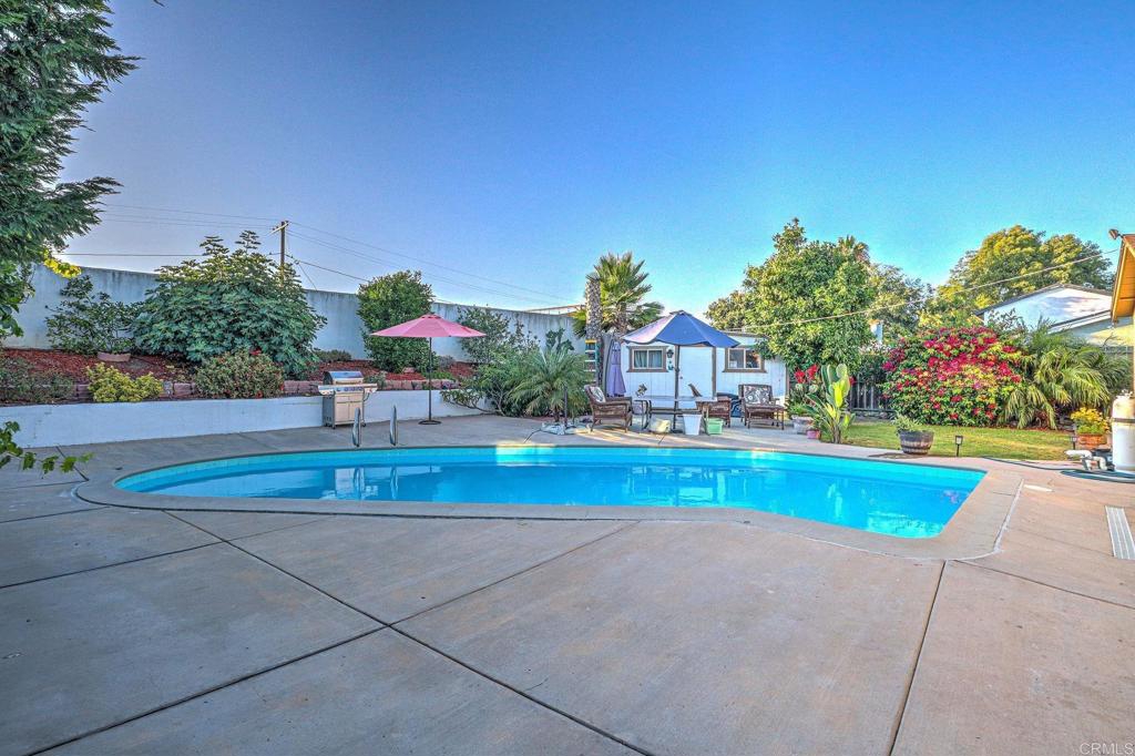 WELCOME WELL MAINTENANCE UPDATE KITCHEN GRANITE COUNTERS, LAMINATED FLOORS GREAT LOCATION QUITE NEIGHBORHOOD CLOSE SHOPPING CENTER NEAR TO FREEWAYS , YOU WILL LOVE THIS BEAUTIFULL HOME ON YOU FIRST VISIT , LARGE BACK YARD WITH SPARKLING LARGE POOL TO ENJOY WITH FAMILY .LUSH LANDSCAPING , A LOT SPACE FOR GARDENING AND RELAXING. MATURE FRUIT TREES. THE GARAGE CONVERTED ON BEDROOM