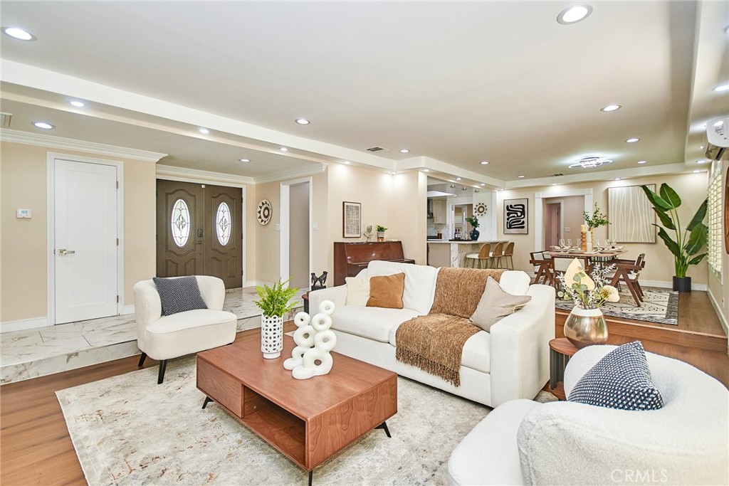 Rare Single-Story Home with Dual Master Suites in Prestigious South Hills!
This elegant, spacious, and tastefully upgraded 4-bedroom, 3-bathroom home has been meticulously remodeled with top-of-the-line materials and thoughtful design, making it ideal for multi-generational living. Featuring two master suites, the primary retreat offers a luxurious and private oasis complete with a spa-style bathroom, walk-in closet, in-room sauna, and customizable mood lighting for a serene, upscale ambiance.
The chef’s kitchen and bathrooms boast high-quality countertops and durable premium flooring, with a cohesive design that extends throughout the home. A grand statement fireplace adds sophistication to the main living space. Additional upgrades include a drinking-grade water filtration system, full-house Ring alarm system, high-end range hood, and gas cooktop. Central HVAC ensures year-round comfort, complemented by two additional split AC units and a whole-house water softener system for added convenience.
Situated on a generous lot, the expansive backyard is perfect for entertaining, gatherings, or peaceful relaxation. A two-car garage and extended driveway provide ample parking space.
Located in the highly sought-after South Hills neighborhood, just minutes from Cortez Park, shopping centers, fine dining, Mt. SAC College, the 10 Freeway, and Grand Avenue. Within an award-winning school district, this beautifully maintained home is truly a rare find. Don’t miss this exceptional opportunity!
