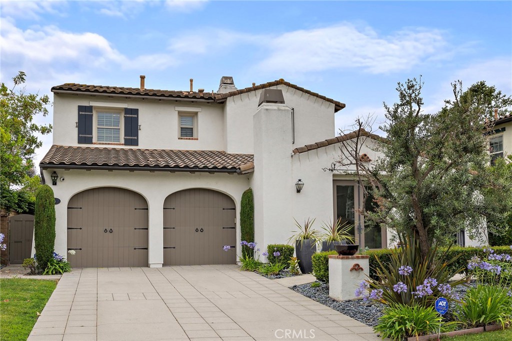 Experience timeless Spanish-style architecture in this beautifully upgraded home located in the prestigious guard-gated community of Covenant Hills, within the Segovia enclave of Ladera Ranch. This thoughtfully designed residence features a spacious and functional layout, including a gourmet kitchen with sleek quartz countertops, stainless steel appliances, and a large center island that opens seamlessly to the inviting family room. A generous formal dining room is perfect for entertaining, while the upstairs loft with a built-in desk offers an ideal space for a home office or study. Outdoor living is just as impressive, with a gated front courtyard and a private backyard complete with a built-in BBQ, perfect for alfresco dining. Additional highlights include a 3-car tandem garage and a full driveway, providing ample parking and storage. Located in one of Ladera Ranch’s most exclusive neighborhoods, this home offers access to resort-style amenities, scenic trails, community events, and top-rated schools—an exceptional opportunity to enjoy the best of Covenant Hills living in a beautifully maintained and upgraded home