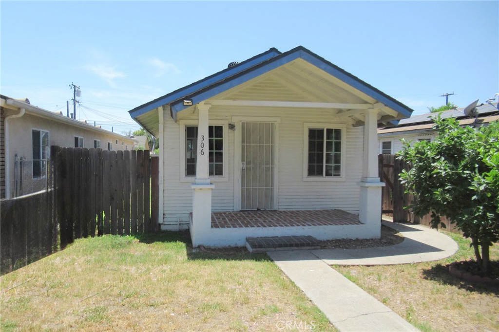Charming cottage-style home bursting with potential and ready for your vision! With a timeless design and open-shell layout, this is a true blank canvas—perfect for creating your dream home or a standout investment. The deep lot with alley access offers endless possibilities: build an ADU, create a lush outdoor living space, build a garage or workshop, or use the space for RV parking. Inside, the absence of interior walls gives you full creative control to design a space that fits your lifestyle. Opportunities like this don’t come often—schedule your viewing today and imagine the possibilities! SOLD AS IS. Property has code violations and is red tagged. Future owner will need to submit plans and pull permits to remodel. (To help visualize this home’s floor plan and to highlight its potential, virtually renovated photos have been added to added to this listing.)