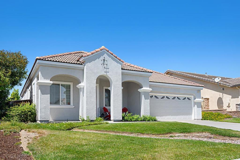 This Beautiful 4-bedroom, 3 bathroom home situated on a quiet cul-de-sac in desirable Murrieta Oaks, combines the convenience of single-level living with the bonus of a bedroom, bath and loft on the 2nd level. As you enter the main level, you are greeted by the formal living and dining rooms. The kitchen is equipped with stainless steel Kitchen-aid appliances, granite counters, a large island and ample storage. The kitchen opens to the family room with a cozy fireplace. You’ll love the open-concept design with its vaulted ceilings and abundance of natural light. The primary suite, 2 secondary bedrooms, bathroom and laundry room are all on the first floor. Upstairs there is a spacious loft, 4th bedroom and bathroom. Patio doors from the family room lead to a serene and private yard with patio cover. This home is conveniently located in a prime Murrieta location between I-15 and 215 for easy freeway access as well as being close to nearby shopping, dining, parks and great schools. And there are NO HOA FEES!