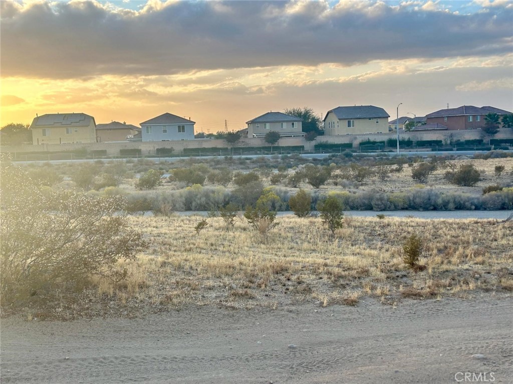 Expansive Lot with Stunning Views in Victorville, CA – 27,443 Sq Ft!
Discover the perfect opportunity to build your dream home or investment property on this spacious 27,443 square foot lot in the growing city of Victorville. Nestled near a well-established neighborhood, this parcel offers a blend of privacy and convenience with beautiful desert and mountain views that stretch across the horizon.
Located just minutes from local schools, shopping centers, restaurants, and parks, this land comes with utilities available nearby — making it ready for your vision to come to life. Enjoy the benefits of a peaceful residential setting while staying close to major roads like the I-15 freeway for easy commuting.
Whether you're looking to build now or hold for future development, this lot offers both potential and value in one of the High Desert’s most desirable areas.