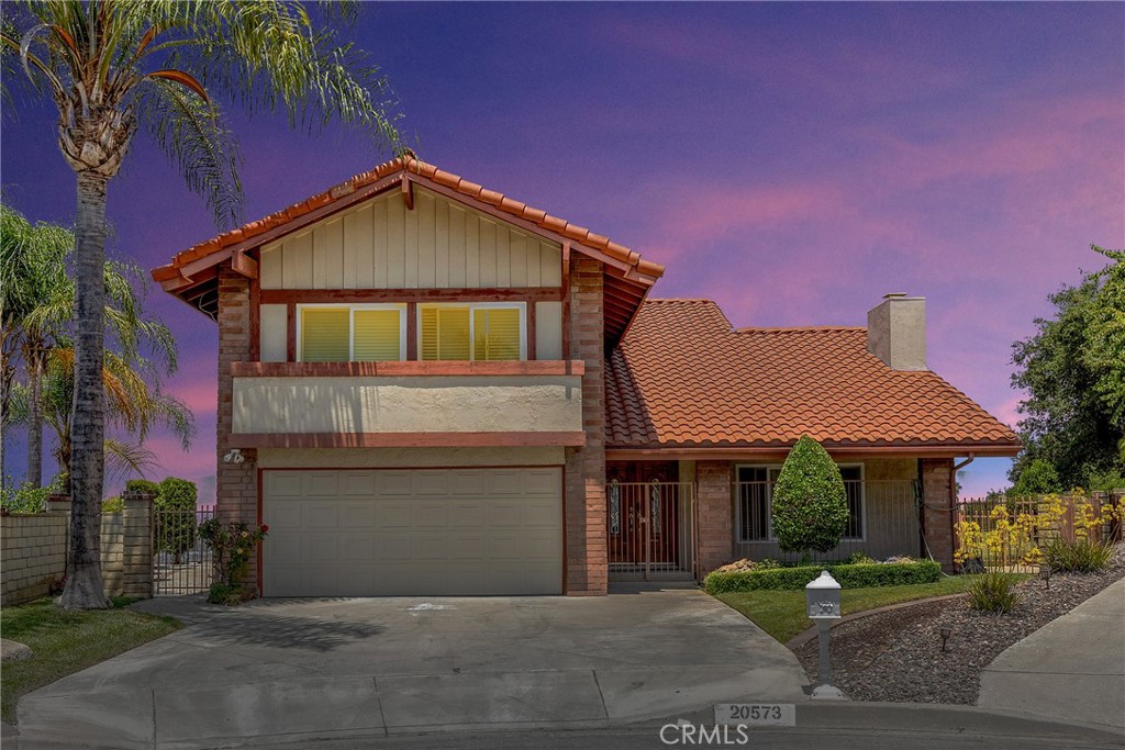 Welcome to 20573 Missionary Ridge St – a beautifully remodeled 4-bedroom, 3-bathroom home nestled at the end of a peaceful cul-de-sac in one of Walnut’s most desirable neighborhoods. With 2,426 sq ft of living space on an 8,417 sq ft lot, this home offers the perfect blend of comfort, elegance, and convenience.
As you step inside, you're greeted by dramatic high ceilings and a striking floor-to-ceiling rock fireplace that anchors the spacious living room and formal dining area. Large dual pane windows fill the home with natural light and frame panoramic views that stretch across the valley — the perfect backdrop for everyday living or entertaining guests.
The layout includes four generously sized bedrooms and three updated bathrooms, ideal for growing families or those needing extra space. Thoughtful upgrades and stylish finishes throughout add a modern touch while maintaining a warm and inviting feel.
Outside, the expansive lot provides plenty of space to relax, garden, or entertain — all while enjoying the peace and privacy of a cul-de-sac setting. Conveniently located just minutes shopping, dining, parks, and major freeways, this home truly has it all.
Don’t miss your chance to own this stunning view home in the heart of Walnut!