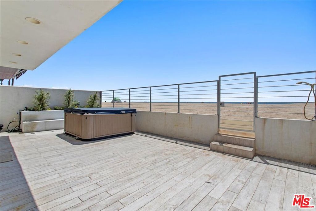 Ground level, DIRECT BEACH ACCESS. Oceanfront 3 bed 2 bath home. With PRIVATE HOT TUB right in front of the beach. You have direct access to the beach and sand. Unobstructed view of the ocean and sand. Brand new flooring being installed. Fully updated throughout with stainless steel appliances. Laundry in unit and air conditioning and heating throughout. Comes with 2 onsite parking spaces, tandem. Walking distance to market, restaurants, and shops in the Playa del Rey village.