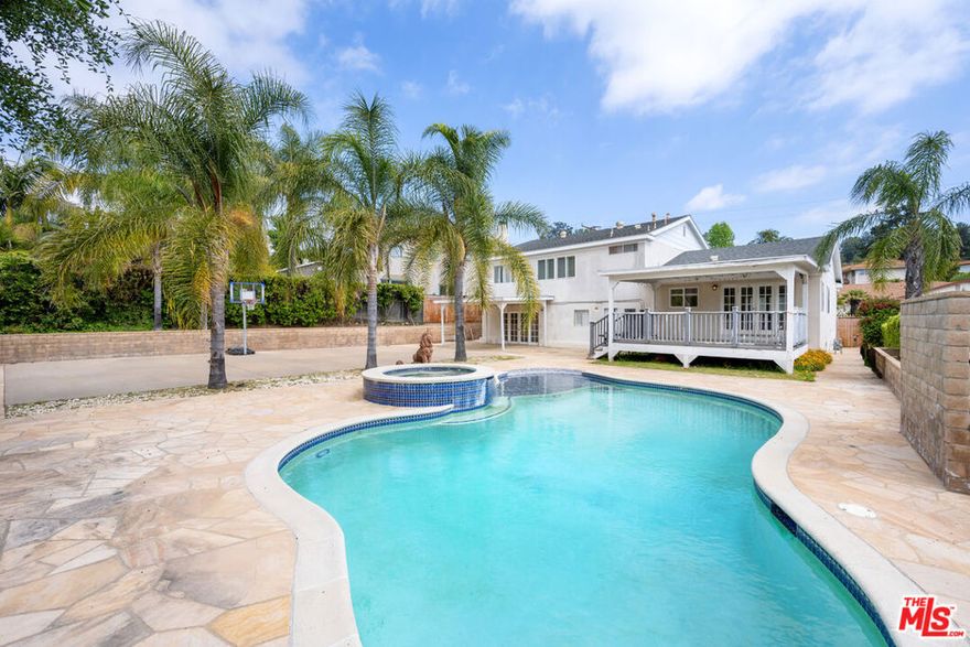 Situated in an esteemed Calabasas neighborhood, this beautifully remodeled tri-level home merges luxury with practicality. The interior features spacious, light-filled living areas adorned with Italian marble flooring, lending an air of elegance and timelessness. Each bedroom is outfitted with exquisite hardwood floors, adding both warmth and sophistication. Ideal for hosting, the home's exterior boasts a newly built pool and jacuzzi, perfect for relaxation and leisure, a sports court, and a newly constructed deck/patio space. With a two-car garage and close proximity to Calabasas High School, this home offers convenience and charm. Available for lease, this stunning residence is ideal for those seeking a refined living experience in a sought-after neighborhood. Do not disturb tenants. Please reach out for a private showing.