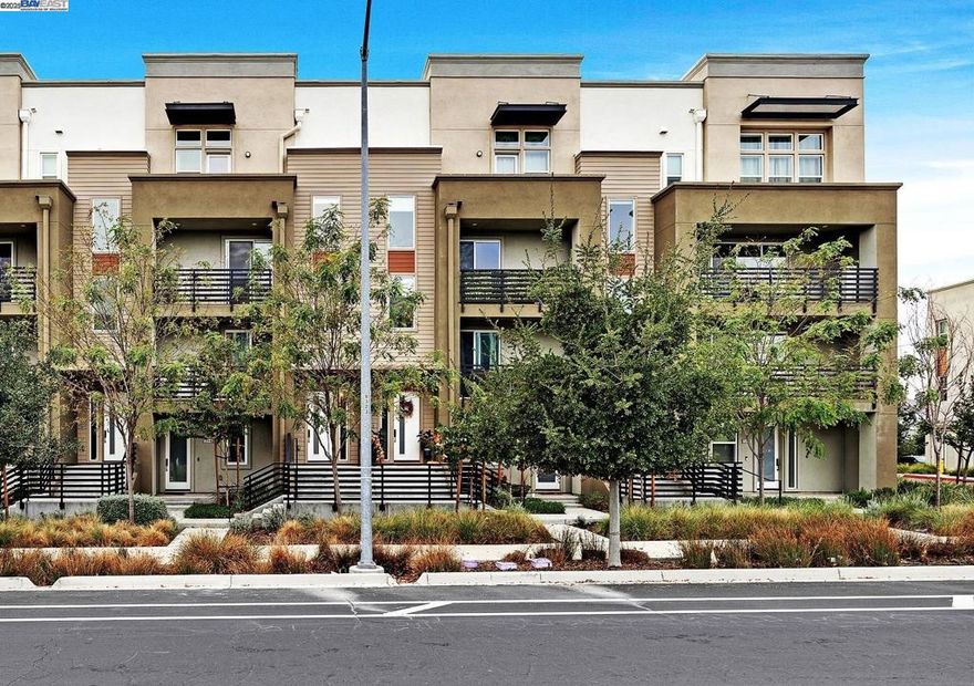 ~ MODERN LUXURY WITH RESORT STYLE LIVING ~  Step into a realm of modern charm and sophistication at 5422 Arnold, located within the Boulevard community in Dublin, with an east-facing door. It is a perfect blend of luxury and comfort wrapped into a delightful townhouse-style condo. With 4 spacious bedrooms and 3 stylish bathrooms, this 2,104 sqft beauty offers ample space for your grandest of living dreams.  The heart of the home is its open-concept living area, where natural light flows effortlessly, creating a warm and inviting atmosphere. This space is perfect for both everyday living and entertaining guests, offering flexibility to suit your lifestyle.  Its chef kitchen stands out making meal preparation a breeze with its stainless steel appliances, generous quartz countertops, and walk-in pantry. Whether you're cooking up a storm or enjoying a simple snack, this kitchen is designed to meet all your needs and culinary adventures.  What's more, living here comes with some pretty sweet perks! Dive into relaxation with a community clubhouse that boasts a pool with cabanas, resident’s lounge, a gym for when you're feeling sporty, and much more! The Boulevard community is near the vibrant and local scene that includes shopping, restaurants, and easy access to the 580 and BART.