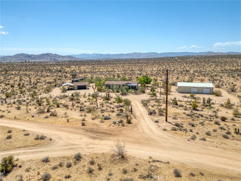 Photo of 59025 La Brisa Dr, Yucca Valley, CA 92284 (MLS # JT26188962)