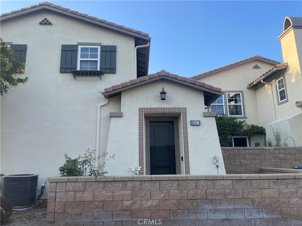 Welcome to the highly desirable community, Vintner's Grove in Rancho Cucamonga. This 2 bedroom 2 full bath end unit condo offers a spacious open floor plan of the kitchen, dining room with a balcony and living room which includes a fireplace. The well maintained gated community amenities include a pool, spa, playground, bbq, picnic and park like areas. Location is key! Conveniently close to freeways, parks, shopping, dining and much more!