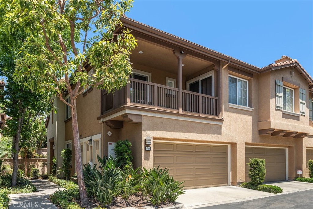 Welcome to your dream home in the heart of Irvine! This stunning three-bedroom, three-bathroom end unit townhome has been meticulously remodeled to perfection, offering a harmonious blend of modern elegance and comfortable living. Upon entering, you're greeted by the airy ambiance and sleek design, with wood laminate flooring seamlessly guiding you through the open-concept living space. The focal point of the home is the newly renovated kitchen, boasting crisp white cabinets, luxurious quartz countertops, and stainless steel appliances, including a stainless steel refrigerator, creating an inviting atmosphere for culinary adventures and entertaining guests. The cozy gas fireplace in the living area adds warmth and charm, making it the perfect spot to relax. With one bedroom conveniently located downstairs next to full bath, this home offers flexibility and convenience for guests or multigenerational living. The spacious laundry room provides ample storage and functionality, making household chores a breeze. The master bedroom features dual closets, ensuring plenty of storage space. Step outside to the expansive patio yard, perfect for al fresco dining, gardening, or simply unwinding in the California sunshine. As an end unit, you'll enjoy added privacy and tranquility in your outdoor oasis. New built in BBQ. This residence also features an attached two-car garage, providing secure parking and additional storage options. Situated in a gated community, you'll experience peace of mind and security, allowing you to fully enjoy the amenities and vibrant lifestyle of Irvine. Conveniently located near top-rated schools, parks, restaurants, and shopping destinations, this home offers the epitome of suburban living with urban conveniences at your fingertips. Don't miss your opportunity to experience the luxury and comfort of this remodeled townhome in one of Irvine's most coveted neighborhoods. Schedule your showing today and make this your new address!