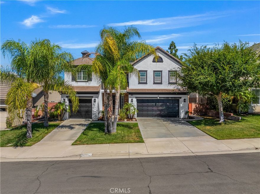 Welcome to 30618 Lily Pond Lane, a stunning 5-bedroom, 3-bath residence with a 3-car garage, nestled in the highly desirable Central Park community of Murrieta. This beautifully upgraded home blends luxury, comfort, and efficiency with soaring vaulted ceilings, a grand spiral staircase, and upgraded waterproof laminate flooring throughout. The open-concept family room with a cozy fireplace flows seamlessly into the gourmet kitchen, which boasts brand-new quartz countertops, a large center island, and freshly painted cabinets. A downstairs bedroom with a nearby bathroom offers ideal guest accommodations, while the upstairs master suite serves as a true retreat with a jetted tub, walk-in shower, dual vanities, and a massive walk-in closet, complemented by three additional spacious bedrooms and a well-appointed bathroom. The backyard is designed for both relaxation and entertainment with a sparkling saltwater pool featuring a new pump and safety fence, along with freshly painted exterior surfaces and patio cover. Efficiency upgrades abound, including a 17.00 kW Tesla solar panel system, Tesla Charger subpanel, new HVAC system, new dishwasher, and new water heater, ensuring long-term savings and convenience. Residents of Central Park enjoy exceptional HOA amenities such as a clubhouse, pool, spa, tennis courts, playgrounds, walking trails, and beautifully maintained parks, all while benefiting from low HOA fees and low taxes. Zoned for the prestigious Temecula School District, this home also offers the rare opportunity for a conventional loan with a very low assumable interest rate, making it an unbeatable find in one of Murrieta’s most sought-after communities.