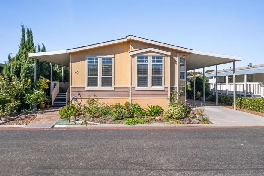 Welcome to 1050 Borregas Ave #92, a spacious and inviting home in the beautifully maintained Cape Cod Village, a 55+ senior community in the heart of Silicon Valley. This peaceful setting offers mature landscaping and a welcoming neighborhood feel. Inside, you'll find a generous floor plan designed for comfort and convenience. The large living room is perfect for relaxing or enjoying time with friends and family. The bright kitchen features a central island, abundant counter space, and plenty of cabinets for easy organization. A dedicated laundry room with newer appliances adds everyday ease. With three bedrooms and two bathrooms, there is room for family visits, hobbies, or a home office. The primary suite includes a walk-in closet and private bath, offering a true retreat. Central heating, AC, and ceiling fans provide year-round comfort. Located near major highways, hospitals, shopping, and dining, this home combines the best of community living with easy access to everything you need.