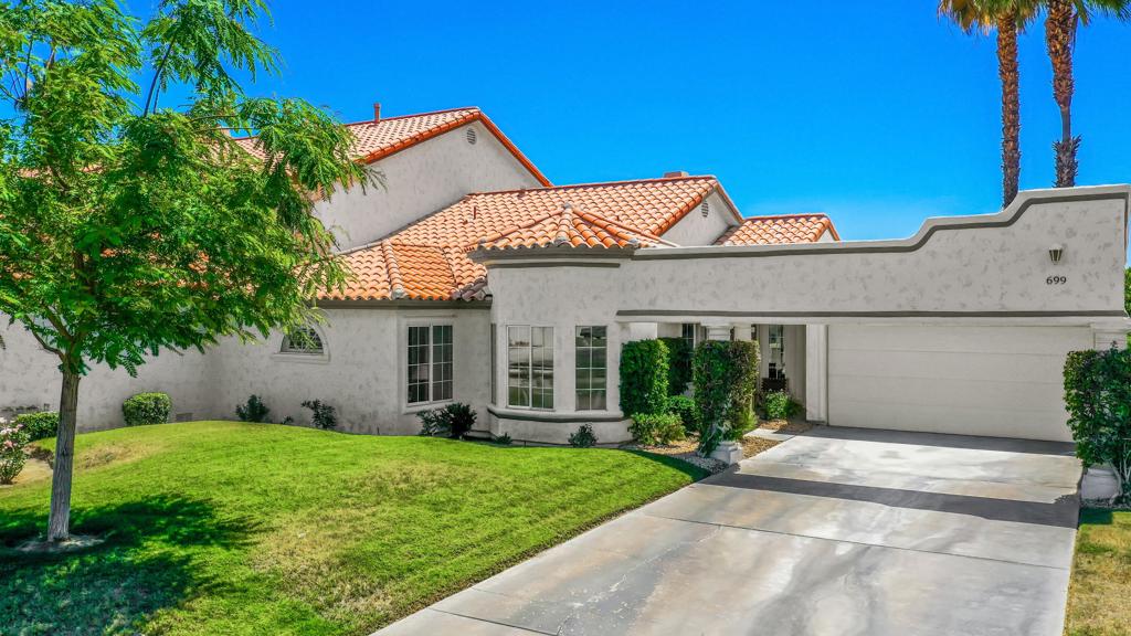 AVAILABLE NOW FOR 2026 SEASON!(JULY-OCT. 2025 $3,900) (DEC.-APRIL 2026 $5,900) The large primary suite is complemented with expansive windows overlooking the golf course and direct access to the back patio. It has 2 full beds and the primary bath has dual vanities. The guest bedroom, located at the opposite end of the condo from the primary suite, offers a full bed. The guest bathroom is located between the guest bedroom and laundry room. The spacious living room has plenty of seating along with a couch with a comfortable pull out bed. There are 2 TVs- 1 in the living room and 1 in the dining room. The dining room has a large round table that seats 8. The kitchen is well equipped with an oven, microwave, stove, air fryer, keurig, and much more. There is also a small table in the kitchen nook that seats 4. The garage is available for guests to park 2 vehicles in there and up to 4 vehicles on the spacious driveway. Need to charge your EV? No problem. The Desert Retreat offers a 220v EV charger. The backyard has a large patio table, sun loungers, bbq grill, and the most amazing view of the golf course and mountains. Community pool, with bathrooms, is located across the street. This serene home is located in Desert Falls overlooking multiple fairways. Enjoy your morning coffee as you watch the sunrise over the golf course from the back patio. Guests can enjoy tennis, pickleball, a fitness facility, restaurant and bar, and 24 hour security.