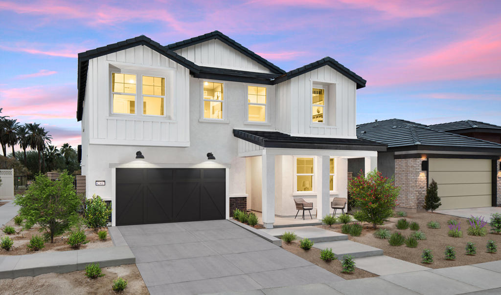Here's your rare opportunity to own our professionally designed and fully upgraded Oban model home, where modern comfort meets timeless Farmhouse charm. This spacious two-story residence offers 3 generously sized bedrooms, 3 full bathrooms, a dedicated home office, and an expansive upstairs loft, providing all the flexibility and space today's lifestyle demands. At the heart of the home is a stunning, kitchen that blends style and function effortlessly. You'll love the rich dark grey cabinetry with sleek flat black hardware, crisp white quartz countertops, and eye-catching pendant lighting over a large central island, ideal for casual meals or entertaining. Premium stainless-steel appliances complete this well-appointed space, making it a dream for any home chef. The kitchen flows seamlessly into the open great room and dining area, creating an inviting space for gathering with family and friends. A sliding glass doors lead to a large, covered patio, extending your living area outdoors, perfect for enjoying beautiful weather year-round. Upstairs, retreat to the luxurious primary suite, designed as your personal sanctuary. It features dual walk-in closets and a spa-like ensuite bath with a freestanding soaking tub, dual vanities, and a separate walk-in shower. The expansive loft upstairs is tailor-made for a home theater, playroom, secondary lounge, or whatever best suits your lifestyle. Two additional bedrooms and bathrooms are thoughtfully located to provide privacy and convenience. Expertly crafted with designer finishes, modern lighting, stylish flooring, and thoughtful details throughout, this model home is truly move-in ready and built to impress. Don't miss your chance to own this beautifully curated home that's been the showcase of the community!