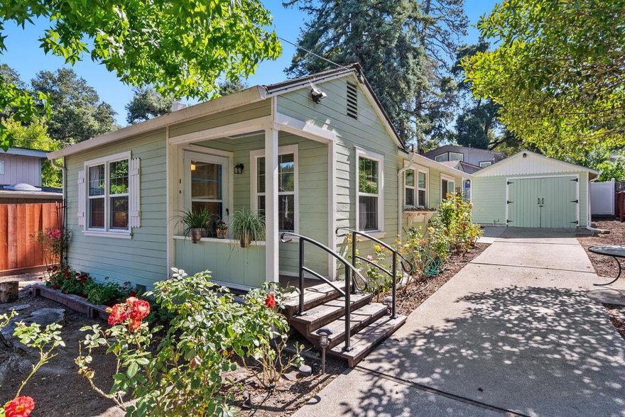 Fall in love with this darling cottage brimming with character and charm. Recent improvements include energy-efficient mini splits, dual-pane windows, and a refreshed kitchen with a sunny dining nook just right for morning coffee or quiet moments. The home offers 1 bedroom plus a flexible bonus room, perfect for a home office or creative space. Step outside to your peaceful retreat, complete with fruit trees, blooming roses, and plenty of sunny garden space to grow, relax, and enjoy. A detached art studio or guest space adds extra versatility, along with a separate garage. The property is fully fenced for privacy and has plenty of parking. Ideally located in the heart of the San Lorenzo Valley, you're close to local cafes, trails for hiking and biking, mountain views, and abundant wildlife. One of the best values in sought-after Ben Lomond. What a special second home to escape or stop renting and make this private haven your own!
