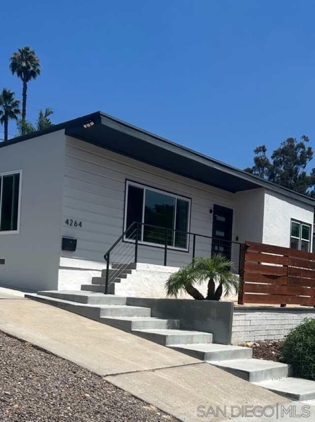 Overflowing with charm, style, and smart upgrades, this La Mesa gem offers the perfect blend of function and flair. Set on a quiet, tree-lined street, this beautifully updated home features 3 total bedrooms—2 in the main house, plus permitted detached bonus room ideal as a private home office, guest suite, or creative studio (this is what is being called the optional 1 bedroom in this listing). The spacious living room flows into a dedicated dining area and a cozy breakfast nook off the kitchen. A separate laundry area adds everyday convenience. The primary bedroom is bright and spacious, while the second bedroom is perfect for a child or guest. Over $50K in upgrades including a 12-panel Vivint solar system ($93.70/mo PPA), Tesla EV charger, upgraded electrical panel and garage power, tankless water heater, mini-split A/C, dual-pane windows, fresh interior/exterior paint, and custom front door. Professionally landscaped front and back yards with turf and vinyl privacy gates complete the vibe. Located just minutes from La Mesa Village, parks, shops, and freeways. Stylish, low-maintenance, and move-in ready—this is the one.