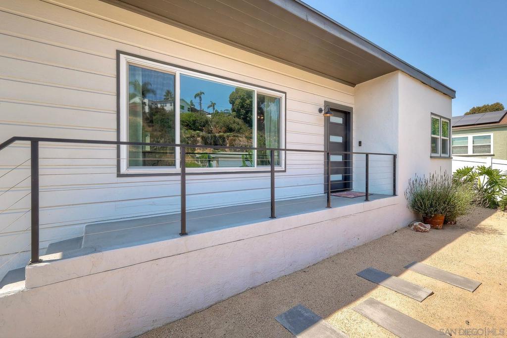 Overflowing with charm, style, and smart upgrades, this La Mesa gem offers the perfect blend of function and flair. Set on a quiet, tree-lined street, this beautifully updated home features 3 total bedrooms—2 in the main house, plus permitted detached bonus room ideal as a private home office, guest suite, or creative studio (this is what is being called the optional 1 bedroom in this listing). The spacious living room flows into a dedicated dining area and a cozy breakfast nook off the kitchen. A separate laundry area adds everyday convenience. The primary bedroom is bright and spacious, while the second bedroom is perfect for a child or guest. Over $50K in upgrades including a 12-panel Vivint solar system ($93.70/mo PPA), Tesla EV charger, upgraded electrical panel and garage power, tankless water heater, mini-split A/C, dual-pane windows, fresh interior/exterior paint, and custom front door. Professionally landscaped front and back yards with turf and vinyl privacy gates complete the vibe. Located just minutes from La Mesa Village, parks, shops, and freeways. Stylish, low-maintenance, and move-in ready—this is the one.