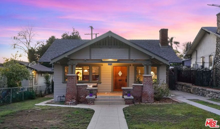 Nestled in the heart of prime North of York Highland Park, this timeless beauty comes to market for the first time in nearly a century, proudly preserving the heritage of its construction in 1913.  With a rich narrative woven into its walls, this cherished abode has been a sanctuary for generations within the same devoted family, bearing witness to the passage of time and the evolution of an era.  Echoes of history blend perfectly with the prospects of the future, where much of the quintessential Craftsman character has been preserved.  As you approach this handsome home, the welcoming front porch provides a perfect spot for morning coffee or losing yourself in a great book.  As you enter, the inviting living room features original built-in bookcases and a deep fireplace.  Blending seamlessly into the lovely dining room, you'll revel in entertaining family and friends, surrounded by the rich history of original and untouched wainscotting, the lovely built-in buffet and a large picture window.  Down the hall, you'll find 2 bedrooms and the bathroom.  Off the dining room is a darling kitchen, complete with vintage tile and a grand O'Keefe & Merritt range. Continue on to the charming light and bright sunroom that's simply perfect for a home office or a reading room.  Out the backdoor, the yard is a blank canvas, awaiting your creative vision where there's room to expand, add an ADU, studio or a pool.  The location is a dream, situated on a quiet street yet just a few short blocks to all that York Blvd has to offer.  For its 110th birthday, this home has been refreshed with new paint inside and out, refinished hardwood floors and features a brand new roof. It also has copper plumbing and a washer hook-up in the sunroom.  This lady is brimming with promise and presents an incredible opportunity to own a character Craftsman home in one of LA's hottest neighborhoods. No tasteless flip here so there's room to add your personal touch. Offers due Mon 4/15 @ 5p