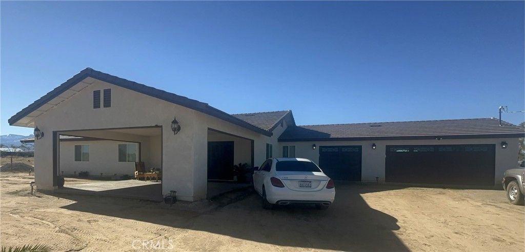 Photo of 14426 Tumbleweed Rd, Phelan, CA 92371 (MLS # WS25267069)