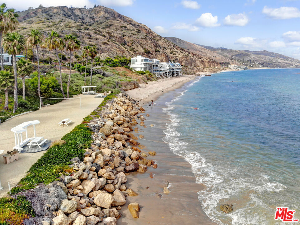 Live the dream in this spacious, ocean view, one bedroom, one bath condo with cozy fireplace. Greet the sunrise every morning with a stroll on the beach. Hit the gym and swim in the heated pool. Play tennis and relax in the hot tub. In the evening BBQ on the beach and enjoy the sounds of the surf. The unit is now leased for one year starting June 1 for $4250/month.
