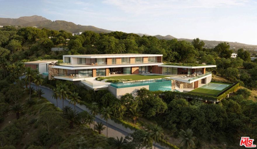 A rare opportunity to develop a world-class estate on 6.2 acres in Pacific Palisades, offering sweeping views of the Pacific Ocean and Santa Monica Mountains. With approximately 1.5 acres of buildable area and a recent soils approval from the City of Los Angeles, this is one of the largest and most significant land offerings in the area. The sale includes preliminary civil and structural plans, as well as a fully realized schematic design by renowned architecture firm Vantage Design Group for a 17,500 SF modern residence. The proposed design is a composition of interlocking volumes arranged around a multi-level courtyard, spanning three levels each with its own material palette and unique perspective. The main living and dining areas are oriented toward the ocean, while guest and spa wings rotate outward to embrace canyon and mountain views. The primary suite and family spaces are positioned to capture sweeping vistas along the coastline. A private, serpentine drive gradually reveals the home, culminating in a dramatic motor court that introduces the residence as a study in dynamic geometries, monumental scale, and refined material contrasts. Interiors are envisioned in rough-hewn limestone, plaster, and timber, and open on all sides to the surrounding landscape. The partially buried lower level houses a free-flowing garage and entertainment zone, illuminated by a dramatic prismatic courtyard. Outdoor amenities in the schematic design include a 6,000 SF lawn, two infinity edge pools, terraced grassy area, and a full-size sports court. The design also includes a home theater, spa, two elevators, multiple entertaining spaces, and garage parking for nine vehicles. A legacy project in one of L.A.'s most coveted neighborhoods, ready for the next visionary to bring it to life.