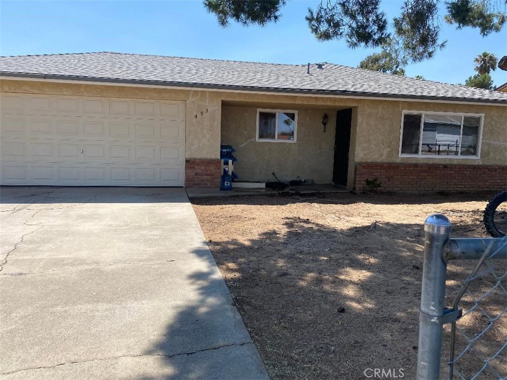 Freshly painted interior and new floor covering are ready for you to move in. This home is located on a half acre (0.53 acre) lot The seller currently has a garden, fruit trees (pomegranate, apricot, peach, black walnut and almond) and chickens. This property provides drive access to the rear yard for those needing extra space. Two sheds and a covered area on the patio provide room for the yard tools and equipment. Seller has replaced the roof, water heater, windows and the garage door. There is a bonus room that is not included in the square footage. This property is shown by appointment only, schedule your viewing today.