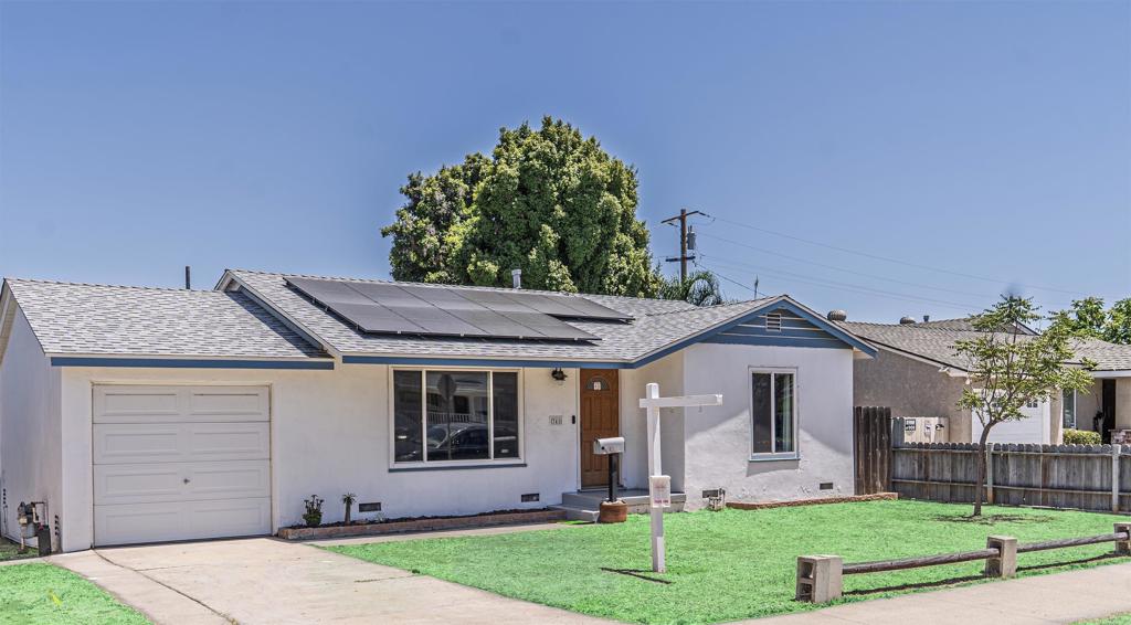 Charming Starter Home with Huge Yard & Paid Solar! This adorable 2-bedroom, 1.5-bath home is the perfect opportunity for first-time buyers or savvy investors. Thoughtfully updated with a newer roof, PAID solar, and newer windows throughout, it offers comfort, efficiency, and style. The interior features newer carpet, a water softener system, and a bright kitchen with updated cabinets and a modern refrigerator that stays with the home! Step outside into the spacious backyard — a blank canvas ready for a garden, pets, play, or possible expansion. Located within walking distance to shops and centrally positioned for easy commuting, this gem is ideal for just about anyone — from homeowners to landlords.