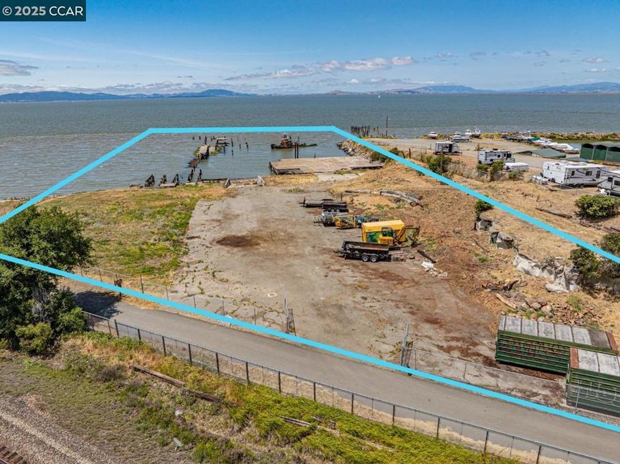 The ±3.78-acre site includes the dry space as well as extending out into the San Pablo Bay. It’s estimated that ±1.70 acres are on land, while the remaining lot extends into the water. The existing pier and platform have deteriorated but are part of the property.  Formerly known as “Joseph’s Resort”, the property neighbors Four Fools Winery and D&R Marine on the Rodeo Waterfront. Multiple restaurant, art related, parking lot, and recreation uses are allowed, in particular those related to Marina type uses. This includes boat repair, boat storage, waterfront sales and services, etc. Buyer should speak to the County to confirm.   Located in quaint downtown Rodeo, the property is located in proximity to local businesses as well as San Pablo Bay. A short drive provides quick access to Highway 80 allowing easy connects to Vallejo, Berkeley, Oakland and San Francisco.