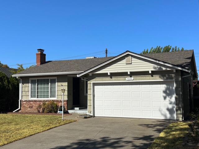 Nestled between Hollywood Park and South City Farms, this beautifully maintained single-story home offers timeless charm and modern comfort. Inside, you'll find 3 bedrooms and 1 full bath, with original touches like vintage kitchen tile and a classic hallway doorbell chime. Gleaming hardwood floors run through most of the home, complemented by newer carpet in the bedrooms. A wood-burning fireplace and wall furnace create cozy winters, while central air keeps you cool through Sacramento summers. Abundant morning light pours in from the homes East-facing design, with shady afternoons perfect for relaxing under the large covered patio. The spacious backyard is ready for your next garden project, barbecue, or outdoor lounge space, and the 2-car garage with rear yard access adds convenience. Don't miss this rare gem on a quiet street... see it before its gone!