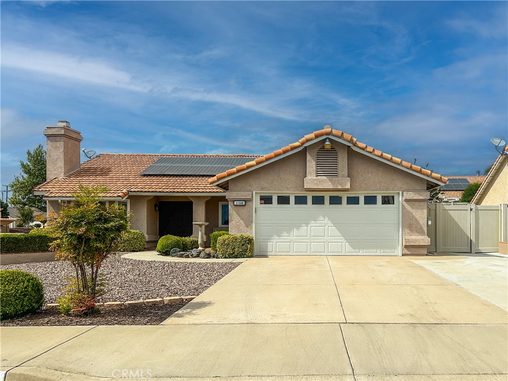 Welcome home to this beautifully cared-for single-story home, perfectly situated in a desirable 55+ community in the heart of Menifee. Featuring 2 generous bedrooms and a versatile bonus room—ideal as a third bedroom, home office, dining room or creative studio—this home blends comfort, style, and functionality.
With thoughtful upgrades throughout, including wood flooring, updated lighting, and an inviting open-concept living space —perfect for both everyday living and entertaining.
The updated kitchen has granite countertops, an island, and ample cabinetry. While at the sink, take in peaceful backyard views, complete with a charming porch swing that invites moments of quiet reflection.
Enjoy California living at its best in the fully landscaped backyard, where a covered patio provides the perfect space for relaxing or gathering with guests. Low-maintenance plantings, mature fruit trees, and a quaint shed on a concrete foundation add both charm and practicality to the outdoor space.
Additional features include an oversized attached two-car garage with room for a workshop, owner paid solar panels, newer windows, and a prime corner lot location. Just minutes from shopping, dining, and medical services, this home offers the perfect balance of convenience and peaceful living.