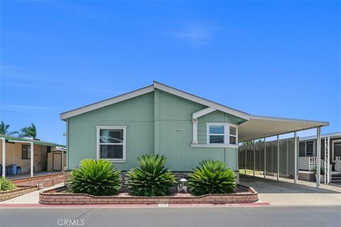 Photo of 1456 E Philadelphia St Spc 390 St, Ontario, CA 91761 (MLS # IV25173308)