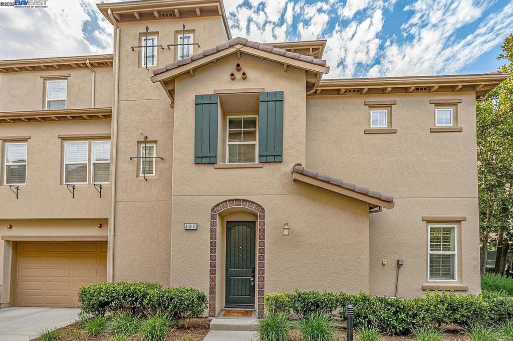 This stunning townhome in Livermore’s award-winning Montage neighborhood checks every box. With 4 spacious bedrooms, 3.5 bathrooms, and 2,190 square feet of beautifully designed living space, it’s the perfect blend of function and flair. Inside, you’ll find rich hardwood floors, a sunlit open-concept layout, and a chef’s kitchen featuring granite counters, stainless steel appliances, and bar seating—ideal for entertaining or everyday living. The layout is incredibly versatile, with a full bedroom and bathroom tucked away on the third floor—perfect for guests, a bonus room, a home office, or creative retreat. Attached two car garage. Step outside and enjoy warm summer nights on the private patio, or take advantage of the community’s amenities with a beautiful swimming pool and gym. Prime location—just minutes from shopping, dining, downtown Livermore, and major commuter routes including 580, 84, and BART.