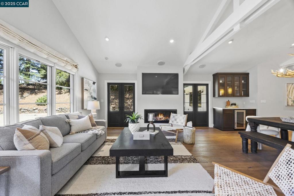 Open Sunday 8.17 1-4pm Charming Orinda Retreat with Guesthouse & Open Beam Ceilings - Tucked in the serene Lost Valley neighborhood, this private and versatile property offers character, comfort, and room to grow. The main house is a 3-bedroom, 2-bath home, and the detached 2-bedroom, 1-bath guesthouse both feature open-beam ceilings that enhance warmth and spaciousness. The main home’s open layout flows seamlessly to a large backyard—ideal for entertaining, dining, or play. The property has hosted everything from casual gatherings to birthday parties with trampolines, play structures, and a treehouse. Ready for your vision, there's potential for expansion with a covered outdoor lounge, fireplace, outdoor kitchen, and lap pool surrounded by drought-tolerant landscaping. The guesthouse is ideal for extended families, teenagers, or a private office/media space. A sunny hillside invites gardening or backyard farming. Located minutes from top-rated schools, Saint Mary's College, parks, shops, and BART, this property offers the best of Orinda living with easy access to San Francisco and wine country. This location delivers the best of Northern California living.