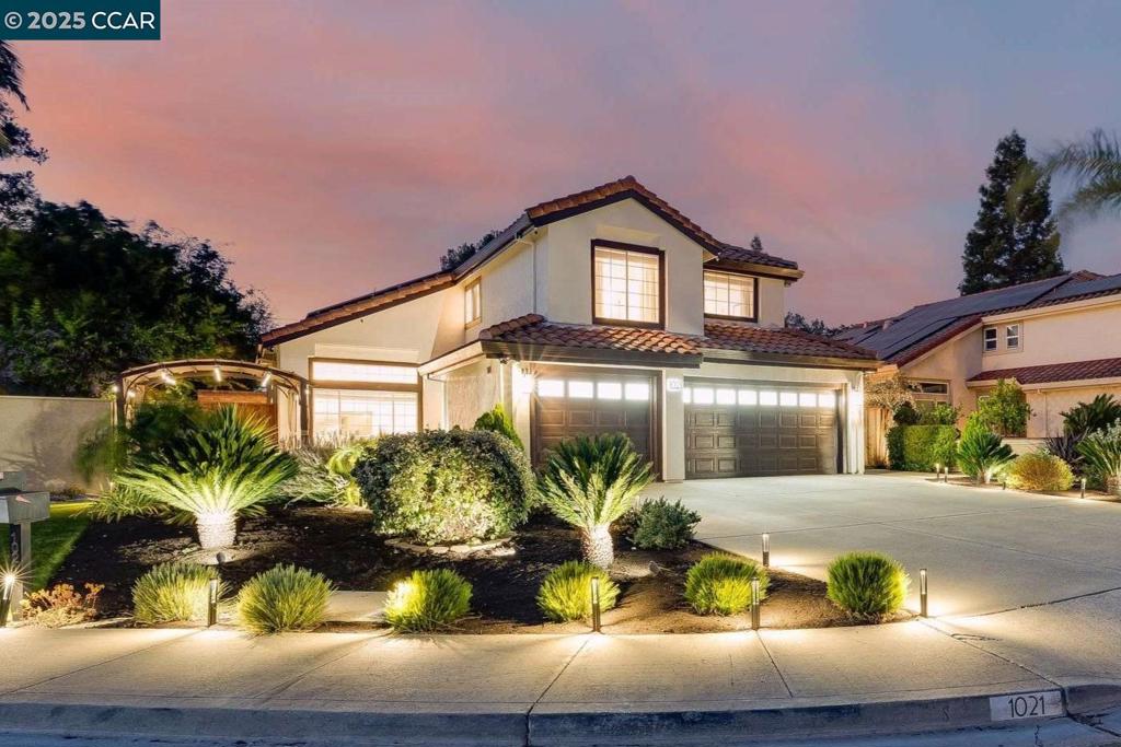 Open Sat & Sun 1-4PM! **SPECIAL 1% Financing Mortgage Buy Down!!** Absolutely stunning updated 2,000+ SF 4-bedroom 2.5 bath home on a cul-de-sac near Downtown! The updated kitchen has recessed LED lighting, Quartz counters w/tile backsplash, SS appliances, white cabinetry, island, breakfast nook, tile floors & numerous windows that fill it with natural sunlight. The adjacent family room has a fireplace, patio door to backyard, custom built-ins with beverage/wine refrigerators & Quartz countertop. The formal living & dining room enjoy vaulted ceilings, recessed LED lighting & wood floors. The primary bedroom has a double door entry, vaulted ceilings, ceiling fan, wood floors and primary bathroom with tile shower, soaking tub, dual vanity w/Quartz counter, tile floors and walk-in closet w/built-ins. There are 3 additional bedrooms with ceiling fans, crown molding & wood floors. The beautifully landscaped backyard is an Oasis to entertain and enjoy with turf lawn, stamped concrete patio, Built-in BBQ, Bonus playroom. Features included OWNED SOLAR w/charger, 3 Car garage, laundry room, tile roof, dual pane windows, central a/c, 1/2 bath downstairs & so much more to see! A great location near K-12 local schools, trails, shopping, entertainment & downtown.