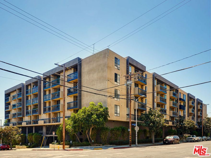 Light and bright 1 bedroom in the highly desirable Hollywood Regis with City Views!  This spacious quiet corner condo only shares 1 wall and features a fully equipped kitchen with granite counters and stainless steel appliances. Central heat and air, a fireplace, in unit laundry and 2 parking spaces make this a complete package. Resort style building with heated pool, hot tub, gym and EV charging. Runyon Canyon, shopping, restaurants and more within minutes. The HOA has a 25lb weight restriction for pets. Available Now!