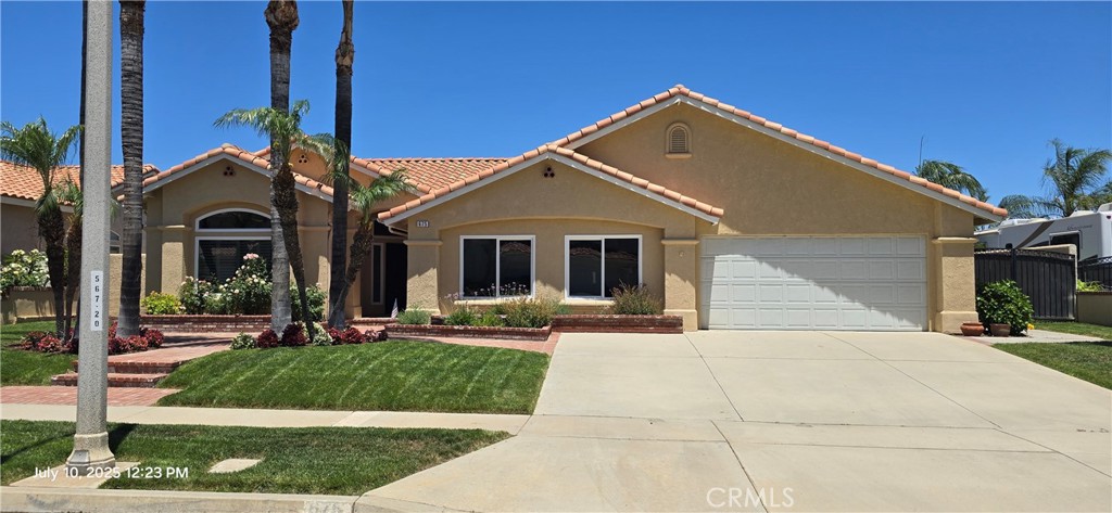 Beautifully remodeled single story POOL/SPA home in South Corona! Great curb appeal with a freshly painted exterior, mature landscaping, and a newly laid lush green lawn! This home is 2095 square feet with 3 bedrooms + a huge bonus room which could be used as a 4th bedroom, game room, theater room, etc...Owner recently remodeled the home with updates including: Brand new luxury plank flooring, fresh interior paint, new lighting, tamper resistant outlets and rocker switches, all new windows & sliding doors with custom factory tint, & newly painted shutters with new hinges. Beautifully remodeled kitchen w/ custom Quartz counters & tile backsplash, Farmhouse sink, pantry w/slide out shelves, deep depth drawers for larger pots & pans, all new Frigidaire Gallery Series applicances, and a wine bar with Butcher Block countertop and built-in wine rack! Spacious Living room is right off the kitchen w/sliders to the back yard & pool area! Large Primary bedroom w/walk-in closet with organizers, and sliders to back yard! Primary bathroom has a separate tub & shower, new toilet, new Quartz counters, and new sinks + fixtures too! The other two bedrooms also have new closet doors & organizers, and the second bathroom has new quartz counters, and a new sink, toilet, and fixtures as well! New front & back yard landscaping including sprinklers, timer, grass, fruit trees, plants, and a new stucco side wall! This home sits above the houses behind it offering privacy, & nice views of Mount Baldy too! Don't forget your bathing suit because this home also features the perfect size inground pool & spa with plenty of room left over to entertain! This neighborhood features wider lots than most with space between the neighbors, ample parking, a 2 car garage, and potential for gated parking on the side too! (Pictures will be updated soon!)