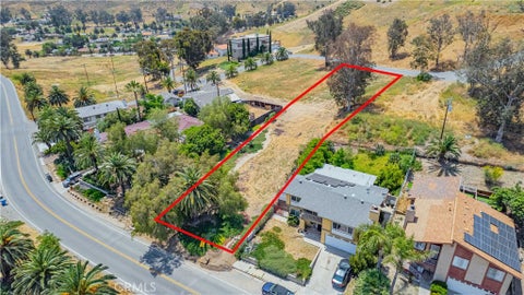 Photo of 457 Gunnerson Street, Lake Elsinore, CA 92530 (MLS # SW26128886)