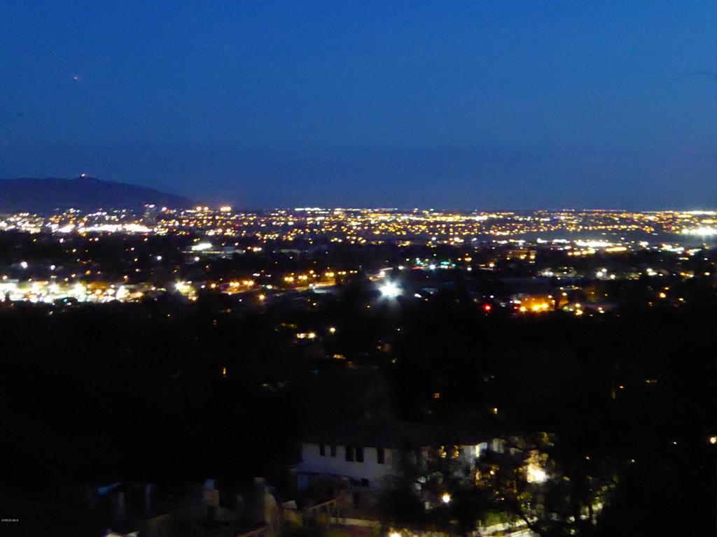 Hugh price reduction on this fantastic view property! Build your new home with gorgeous views of ocean, islands and city lights! Property slopes down from street level.Plans for a new custom 3914 square foot luxury view home for the property are included!