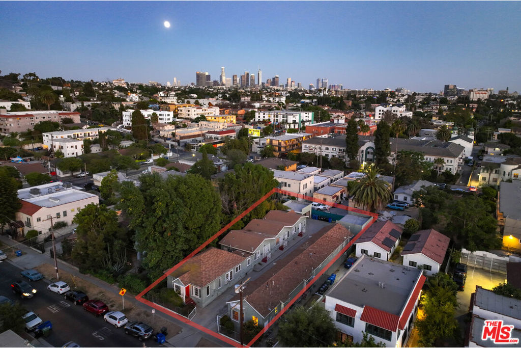 Representing a remarkable OPPORTUNITY ZONED 7-unit apartment building with 90% current market rents. This property features 6 upgraded 1 bed/1 bath units, and one 2 bed 1 bath unit. Each has its own washer and dryer. 6 units have been thoughtfully upgraded showcasing open layouts that enhance the living space. ALL UNITS HAS ITS OWN PARKING. Located in a bustling hip neighborhood, on the edge of Silverlake-one of the trendiest areas in LA. This property benefits from excellent walkability to popular, trendy cafes and restaurants. The combination of upgraded units and a thriving location offers significant potential for rental income growth, making this apartment building an excellent opportunity for savvy investors looking to expand their portfolio in a high-demand location which is only 5-10 min drive to Hollywood, Los Feliz, Downtown, Koreatown, Echo Park. It doesn't get much more central in terms of location! Don't miss your chance to capitalize on this unique investment opportunity!
