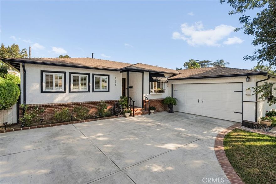 This lovingly maintained and upgraded 3-bedroom, 2-bath home sits on a tree-lined street in desirable Lake Balboa. The inviting floor plan includes a large kitchen with stainless steel appliances included, a convenient laundry room, a spacious step-down living room, and a formal dining area with fireplace. Both the primary en suite and guest bathrooms have been beautifully upgraded.The highlight of this property is the expansive backyard—set on an over 8,000 sq. ft. rectangular lot, ideal for entertaining or relaxing outdoors. Enjoy a covered patio, rejuvenating spa, and gazebo surrounded by lush landscaping, mature trees, hedges, and a grassy area perfect for play or gardening. Conveniently located near Lake Balboa Park—future site of several 2028 Olympic events—with easy access to the 405, 101, and 118 freeways. A perfect blend of comfort, space, and location in the heart of the Valley!