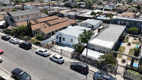 Photo of 1124 E 76th Pl, Los Angeles, CA 90001 (MLS # DW26085226)