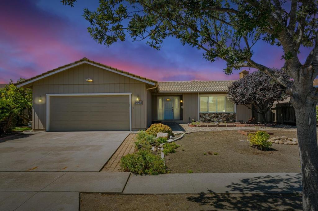 Welcome to this charming 3-bedroom, 2-bathroom home located in the Los Olivos/Riker neighborhood in South Salinas. First time on the market in 50 years! With 1,708 square feet of living space, this home offers a functional layout perfect for modern living. The kitchen is a standout feature, boasting quartz countertops, a convenient island, and a built-in oven range, making it an ideal space for culinary enthusiasts. The home features a variety of flooring, including new carpet in two of the bedrooms, hardwood, and vinyl/linoleum. The family room, combined with the kitchen, creates a welcoming environment for gatherings and relaxation. Stay cozy on cooler nights by the fireplace, a pleasant addition to the living area. For your convenience, the laundry area is located in the garage, which also offers two parking spaces, and a brand new water heater. The interior and garage has been completely painted. Enjoy the blend of comfort and practicality in this well-appointed South Salinas home.