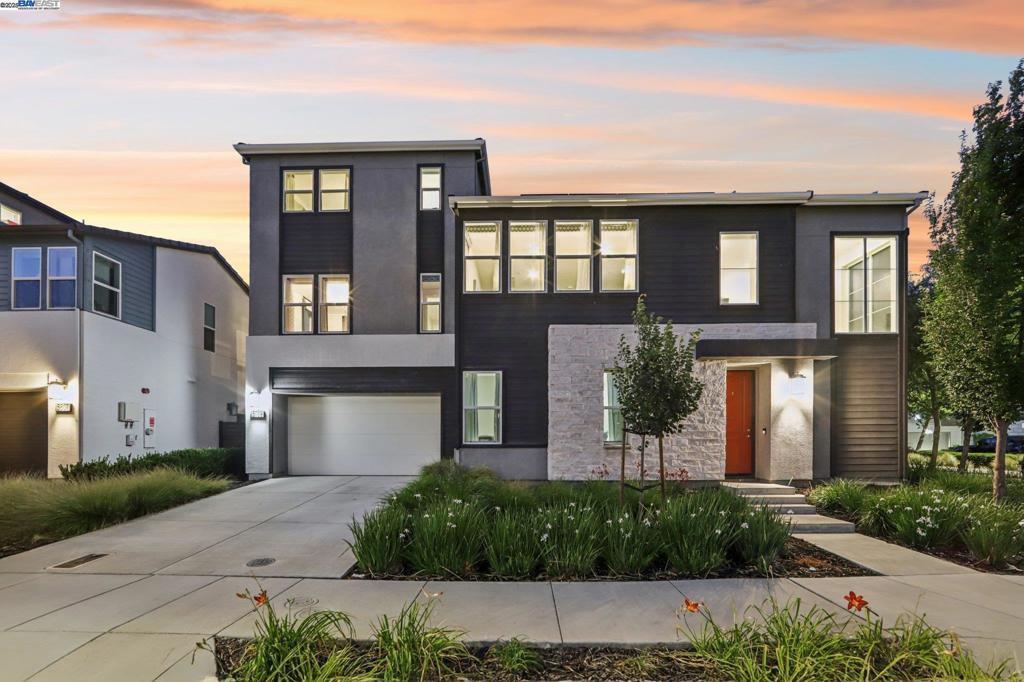 Welcome Home! Ideally situated on a corner lot just steps from The Boulevard’s private clubhouse and pool, this fully detached 5-bedroom, 4-bathroom modern home offers the perfect blend of luxury and functionality. Built in 2019, the home features soaring ceilings, an open-concept layout, and abundant natural light throughout. The chef’s kitchen includes premium stainless steel appliances, sleek countertops, floor-to-ceiling cabinetry, and a large center island that flows into the dining and living areas. One bedroom and one full bathroom are conveniently located on the main floor—ideal for guests or multigenerational living. Upstairs, the spacious primary suite offers a spa-inspired bathroom with dual vanities, a soaking tub, and a large walk-in closet. Additional highlights include generously sized bedrooms, modern bathrooms, designer finishes, and a low-maintenance backyard perfect for relaxing or entertaining. Located near parks, BART, shopping, top-rated schools, and Dublin’s finest dining.Open Saturday & Sunday, 1–4 PM. Don’t miss this incredible opportunity in one of Dublin’s most desirable communities!